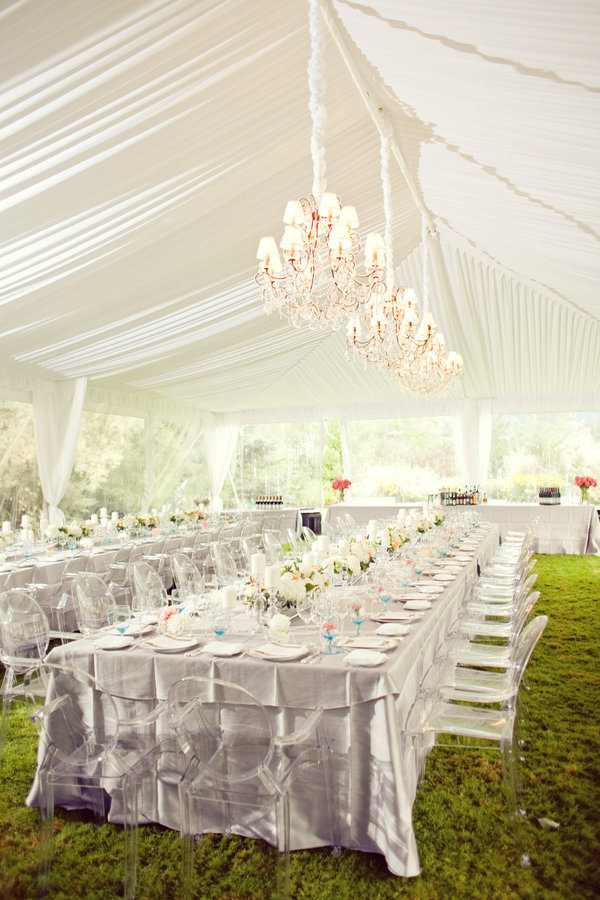 The silver linens give this impeccable floral and table arrangement a 