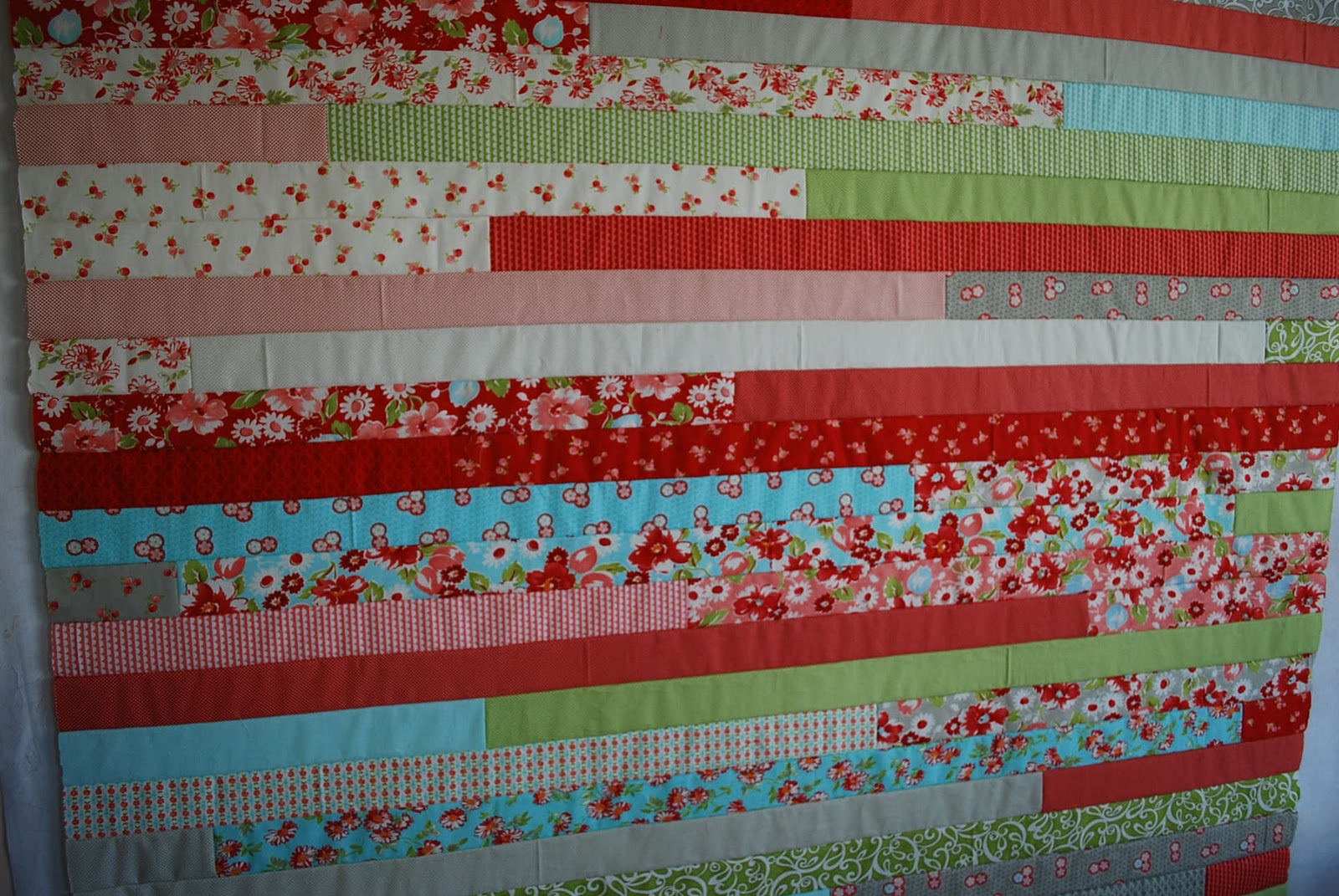 Crafty Garden Mom Jelly Roll Race Quilt + Tutorial