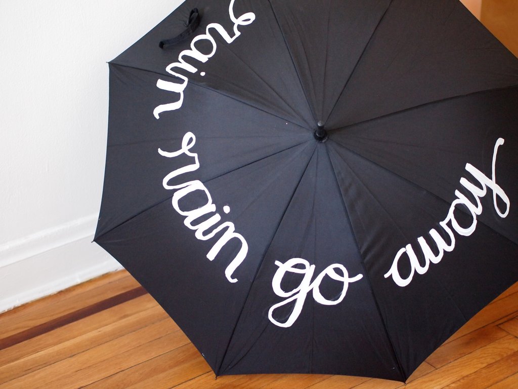 Decorate a "rain, rain, go away" umbrella with fabric paint Pink