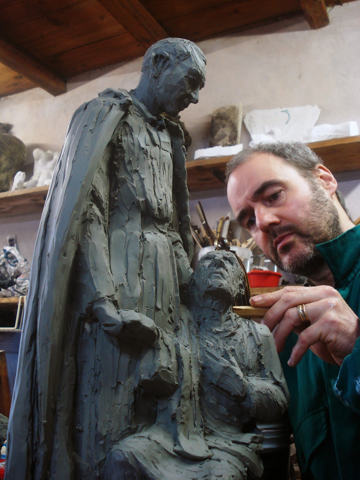 Alessandro Mutto sculture e dipinti Statua S. Camillo de Lellis e il