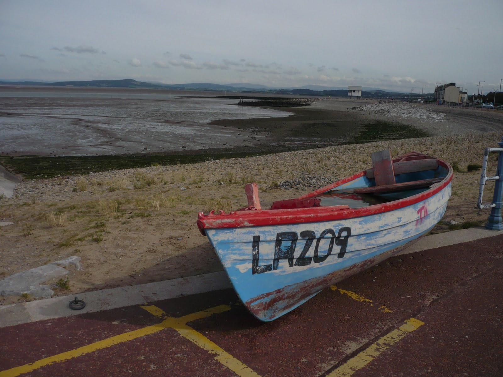 A Raft of Apples Boats and Barriers on the Bay