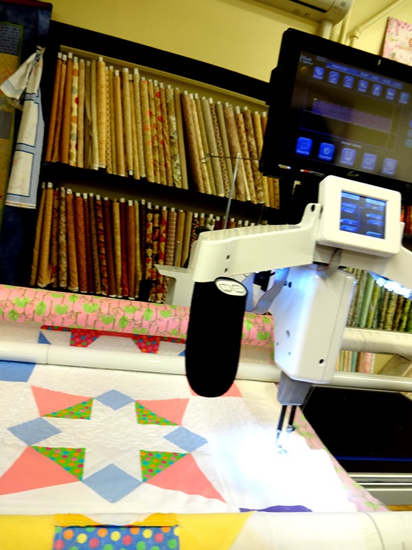 Threadbender's Quilt Shop Long Arm vs. Mid Arm What would you do with a long arm?