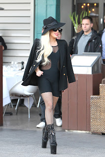 Lady GaGablond long hair, high pumps and blach body suit 