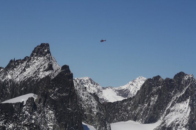 Helicopter and Mountains
