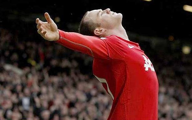 Soccer Extreme Wayne Rooney enjoys the acclaim after his glorious strike 