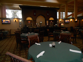 a restaurant with tables and chairs