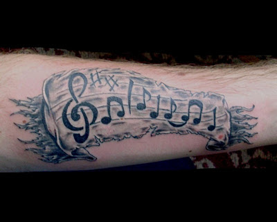 2012 Top Music Notes Tattoos Designs