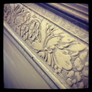 Close up of carved blanket box in Annie Sloan Chalk Paint