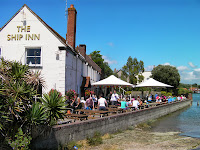 ship inn langstone umbrellas in pub garden