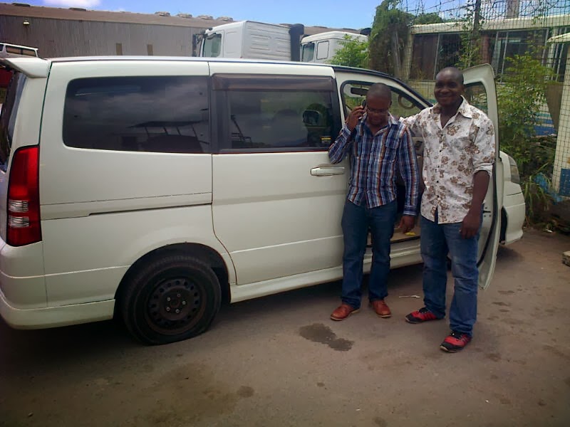 With Mr Nyerenda after He Bought A Nissan Serina