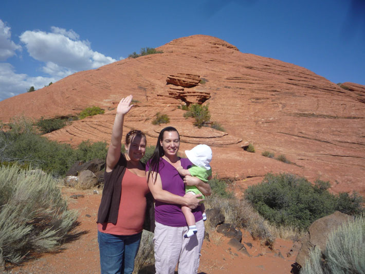 Kelsey, Tanya and Tristan in front of a big rock