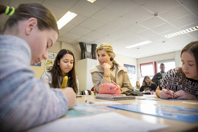 Queen Maxima of The Netherlands opens the Money week 2015 at primary school OBS West in Capelle aan de IJssel, The Netherlands,