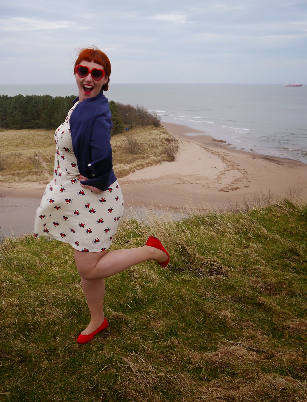 Dreaming of Spring Scottish blogger, Ginger, red head, Vintage style dress, unmbrella print, Nishe dress, dreaming of spring, spring style, leopard print coat, cat eye glasses, Lunan Bay, Beach times