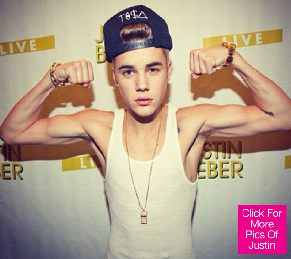 justin_bieber_flexing_muscles_lead.jpg