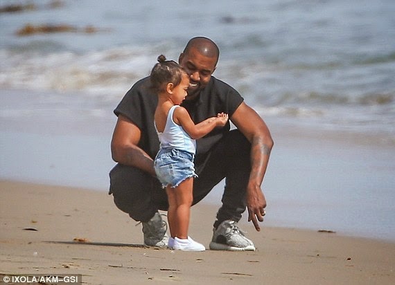 Photos: Kanye West and his daughter, North hit the beach..