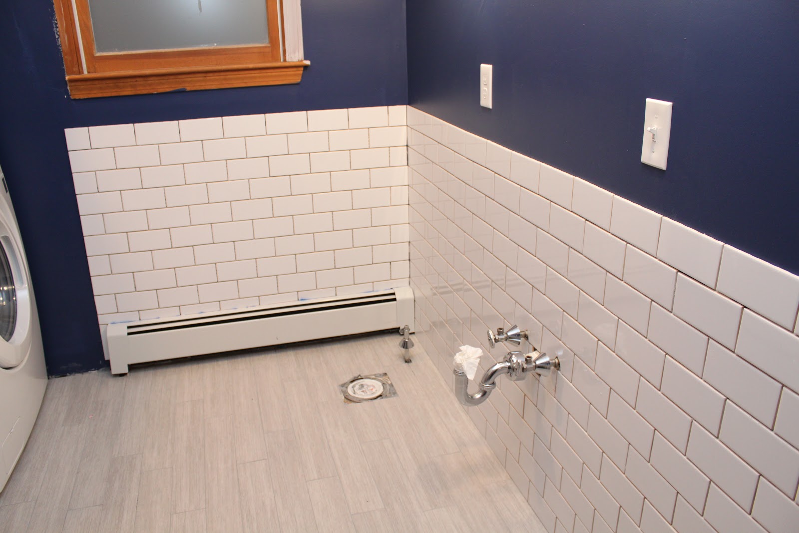 Bathroom subway tile Bathroom Renovation Subway Tile GOING UP!