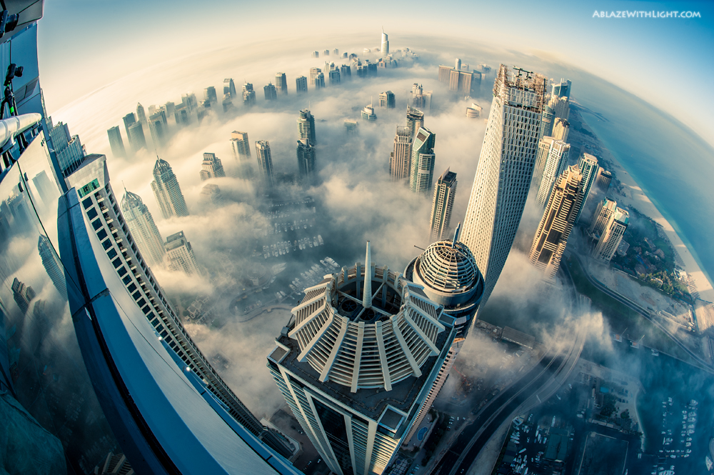 dubai: breathtaking pictures of skyscrapers above the fog dubai: breathtaking pictures of skyscrapers above the fog