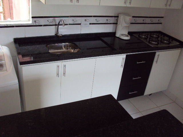 Armário de cozinha com fogão cooktop embutido Armário de cozinha com fogão cooktop embutido