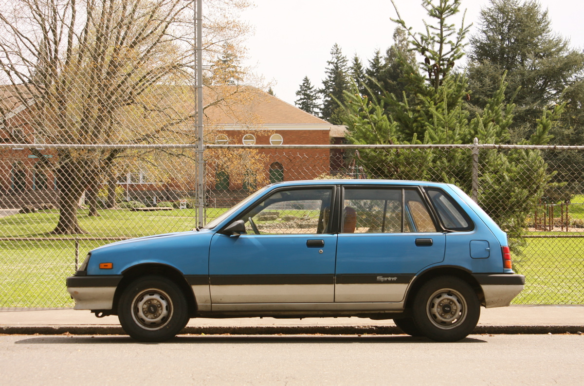 OLD PARKED CARS. 1987 Chevrolet Sprint 5Door Hatchback.