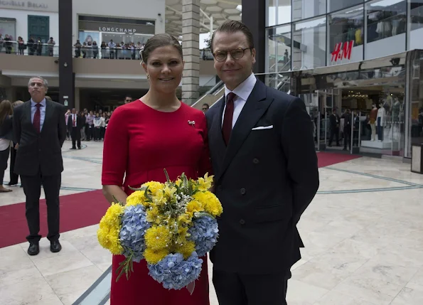 Crown Princess Victoria of Sweden and Prince Daniel of Sweden visit a H&M store at Jockey Plaza