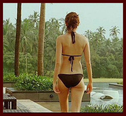 Anushka Sharma walking away in a black hot bikini