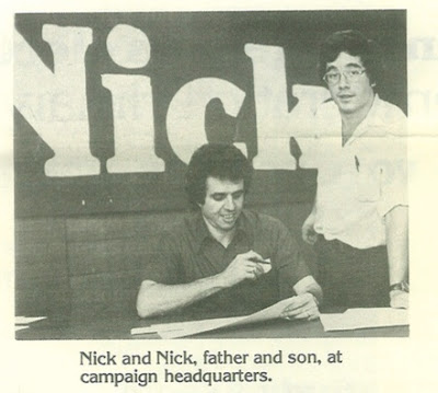 Picture of my father, Nicholas R., seated, me standing, in front of campaign sign that says "Nick"