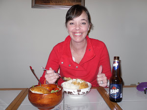 Smile & thumbs up, that soup is delicious!