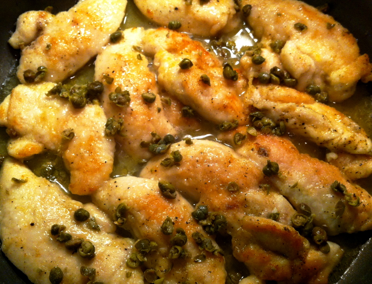 lemon chicken with capers served over a {delicious} pea puree with oven