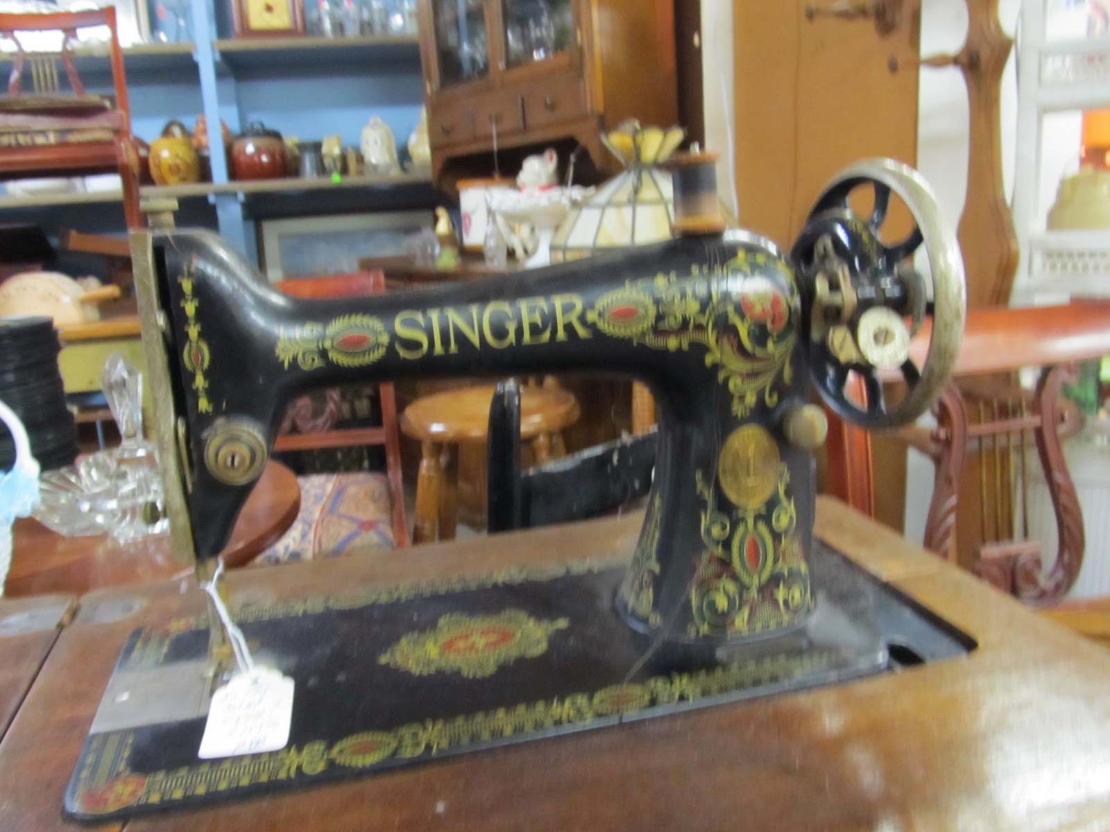 Little Singer Sewing Machine in cabinet