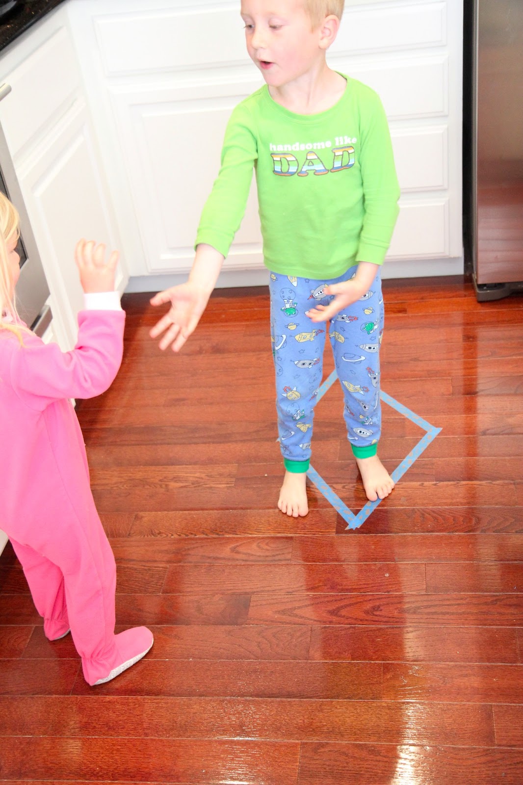 Toddler Approved! Tape Shape Matching Game