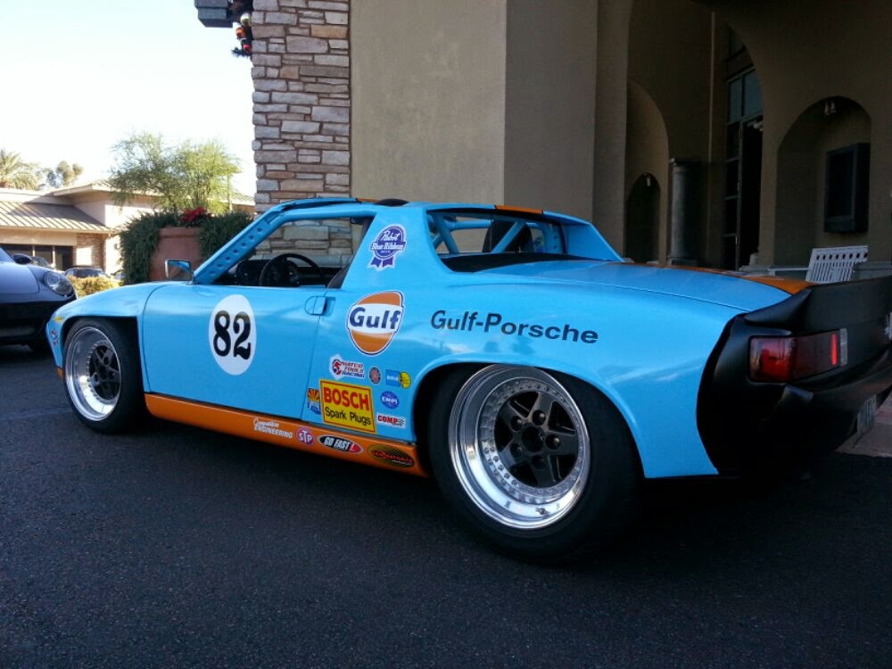 Baby blue and orange - gulf racing.