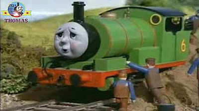 Percy train engine rail workmen dug out the earth mound have a drink of water plus new coal nuggets