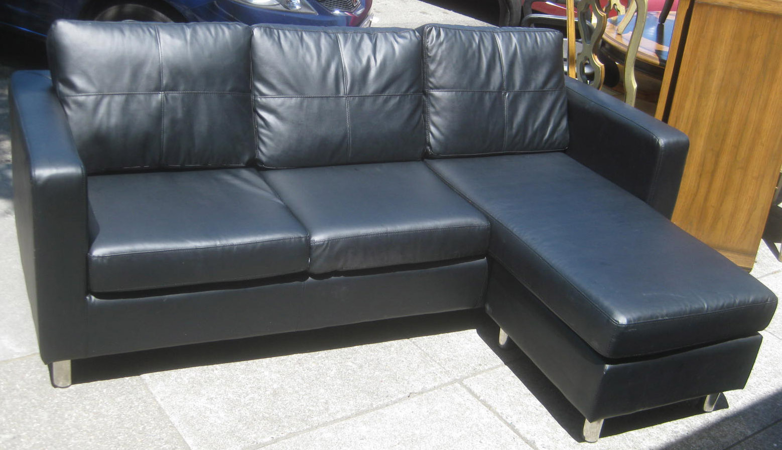 simulated leather sofa meaning