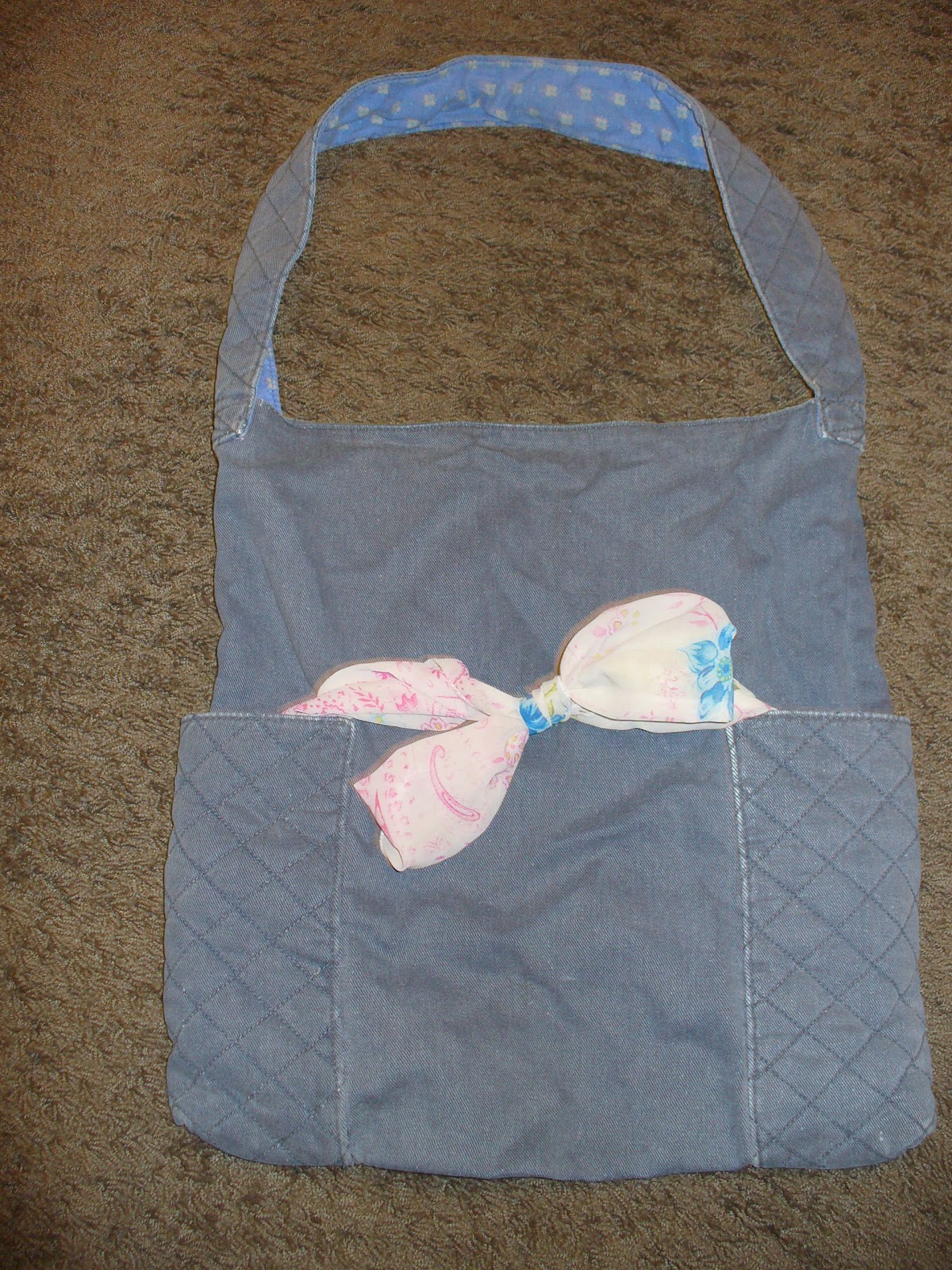 Kai Leigh Bow 22 Ways to Make a Boring Bag Exciting Using Only a Scarf.