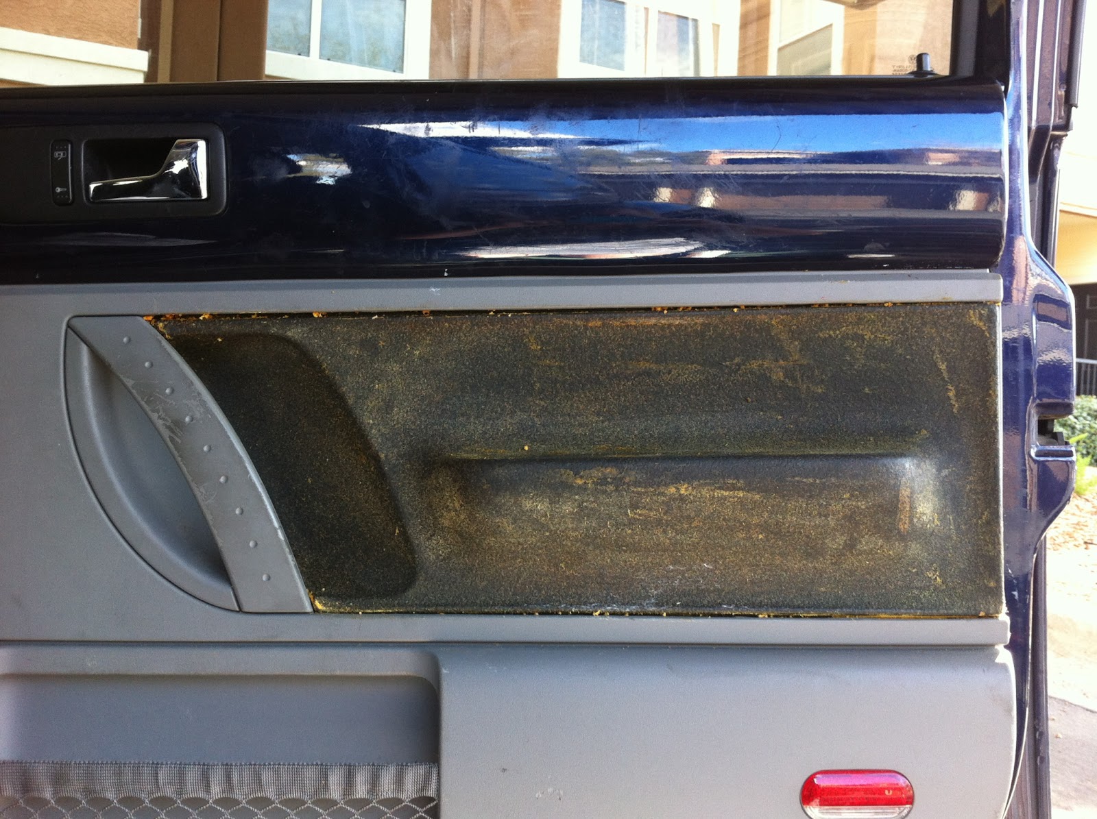 Between the Rabbit's Ears DIY Interior Car Door Makeover with Mod Podge