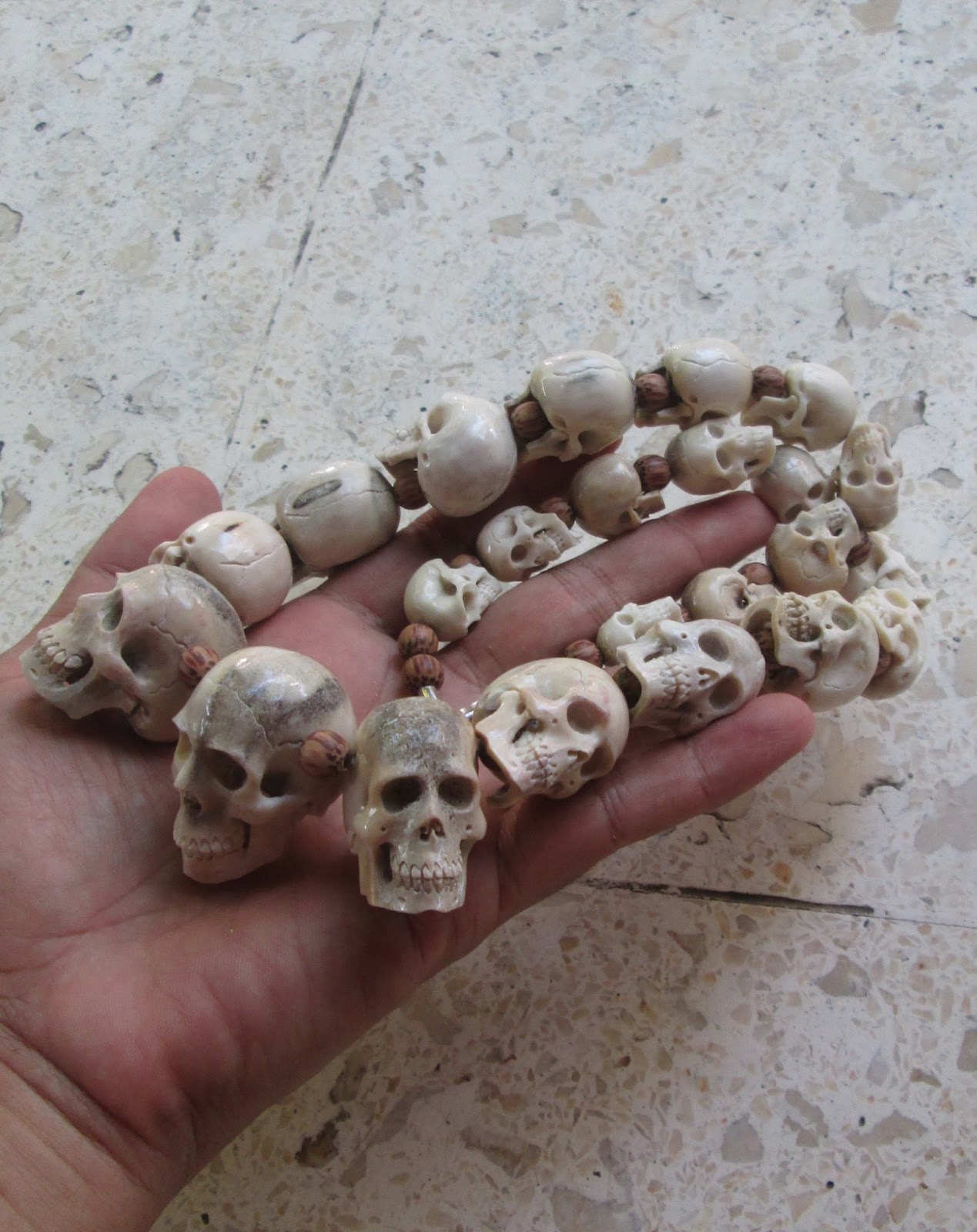 Skull Necklace Carving in Antler Skull Necklace Carving in Antler