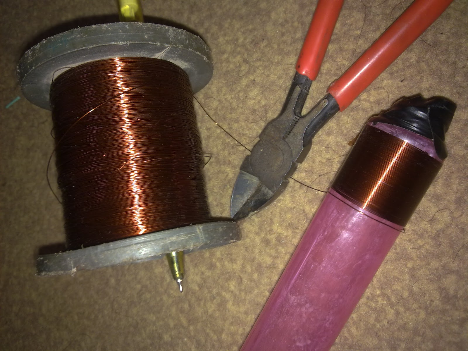 Making Tesla coil with Flyback TV transformer and energizing tube light