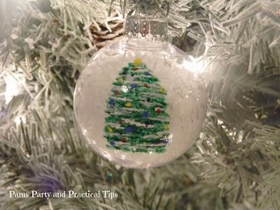 a picture of the finished painted Christmas tree ornament 