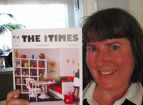 Assistant Editor Anna-Maria C Sviatko holding up the February 2014 issue of The tiny Times