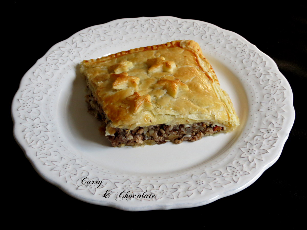 Empanada de hojaldre con carne picada y morcilla de Burgos - Morcilla de Bugos and pork stuffed puff pastry Empanada de hojaldre con carne picada y morcilla de Burgos - Morcilla de Bugos and pork stuffed puff pastry