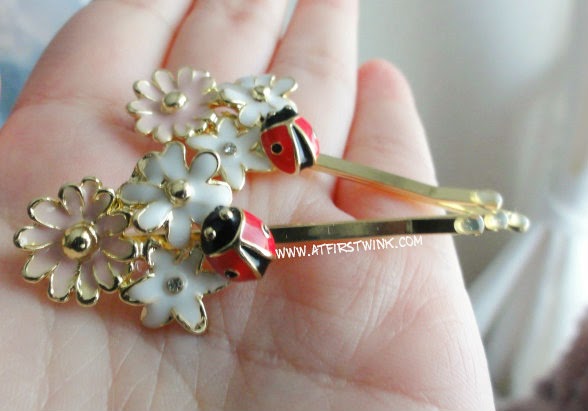 New Look hair pins with flowers and ladybird