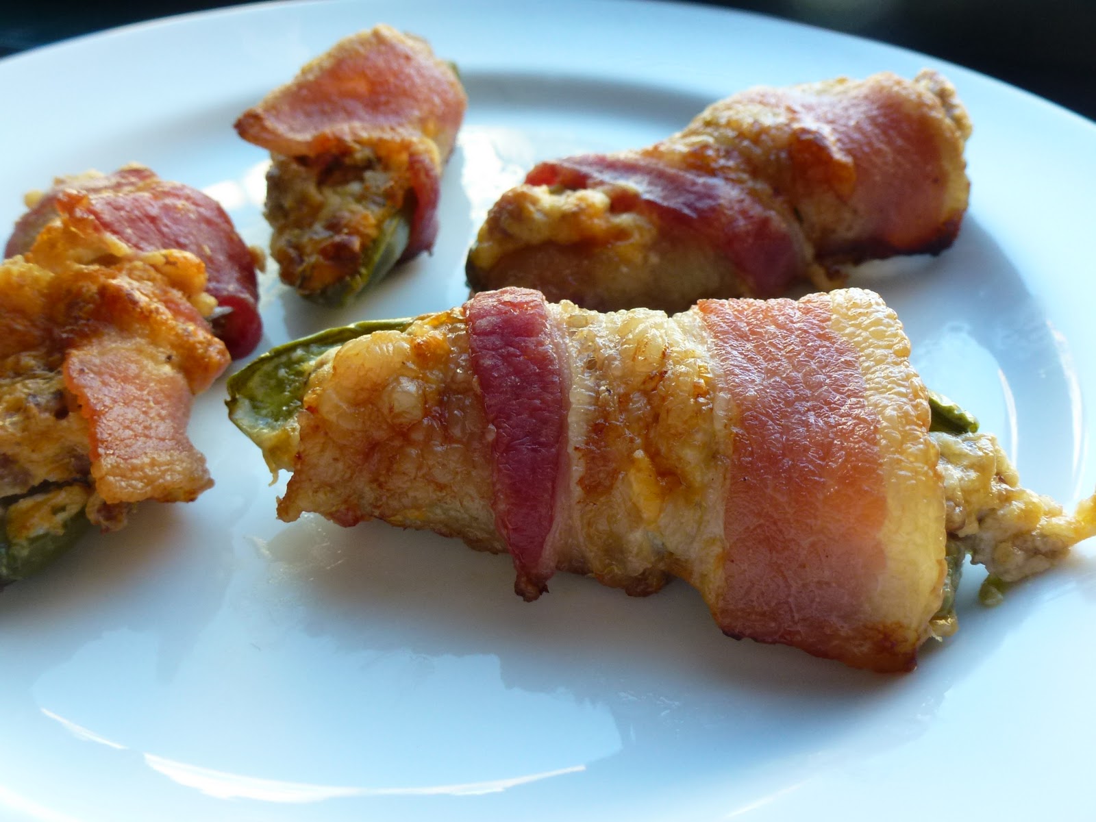 Hardly Housewives Sausage Stuffed Bacon Wrapped Jalapeno Poppers