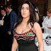 Amy Winehouse's Post Humous Album Debuts at No 5 on Billboard ,Tops Uk chart