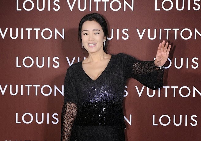 Chinese actress Gong Li poses during the opening ceremony for the