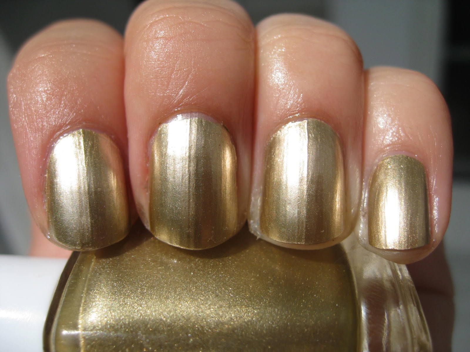 2. Essie Nail Polish in "Good as Gold" - wide 4