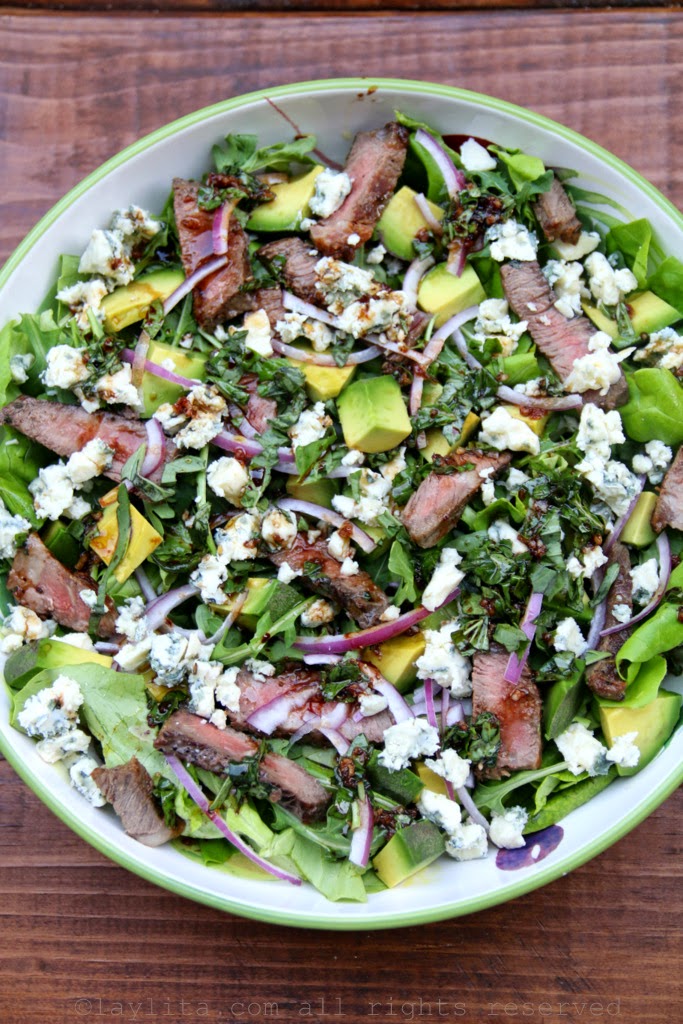 Steak salad with blue cheese, avocado and basil balsamic dressing