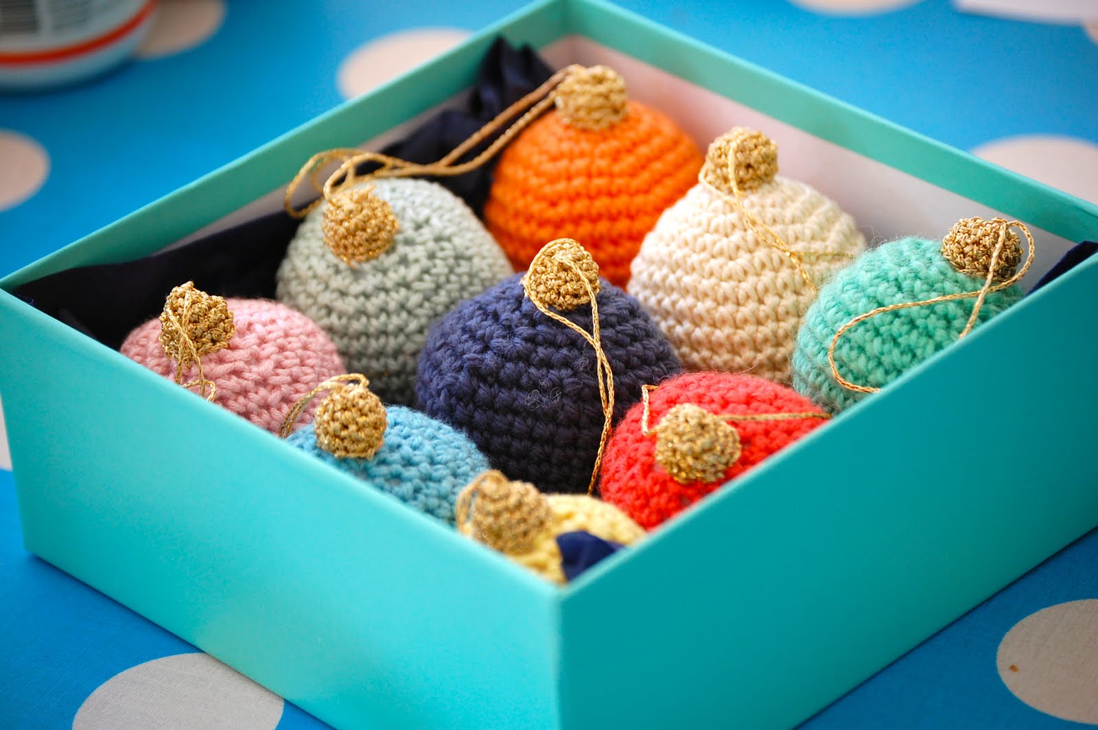 love this wreath ornament made by crocheting over a plastic ring ...