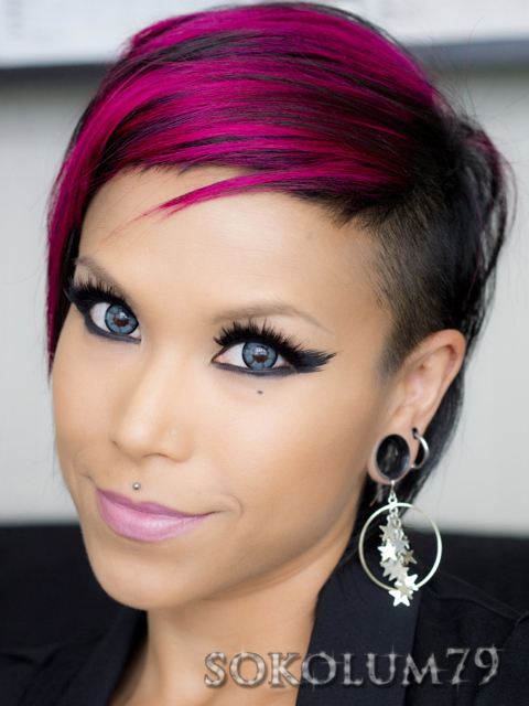 feathered eyeliner, grey circle lenses and side cut
