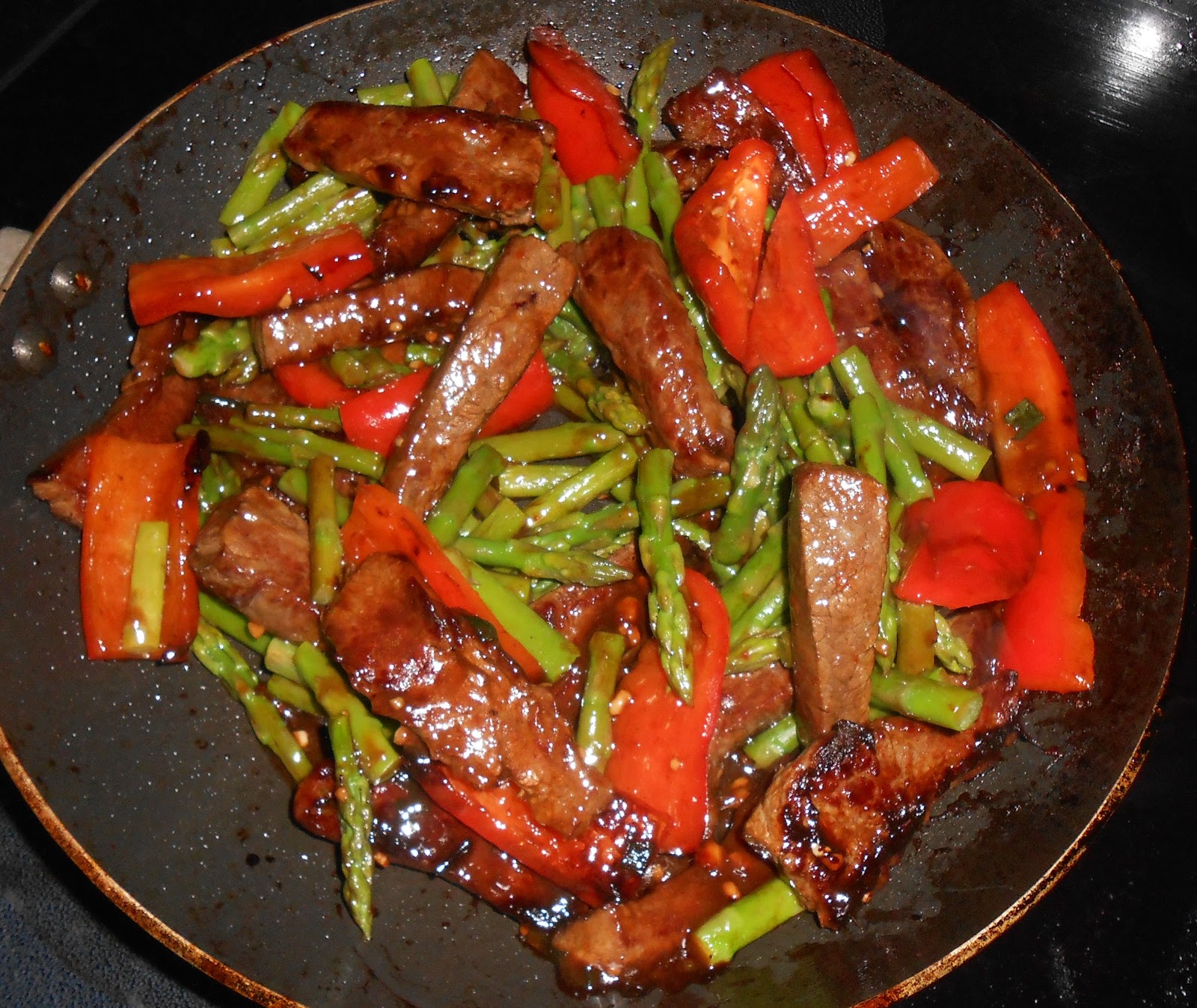 Domestic Education Flank Steak, Asparagus, and Red Pepper Stir Fry