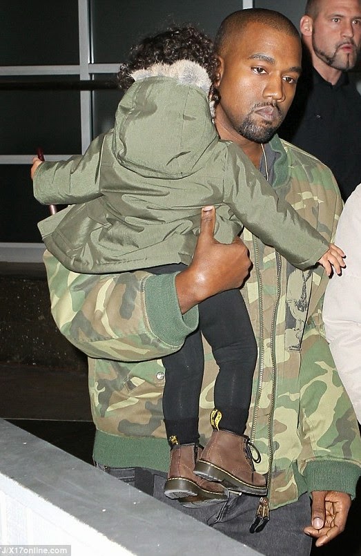 Photos: Kanye West & daughter step out in matching fight jackets